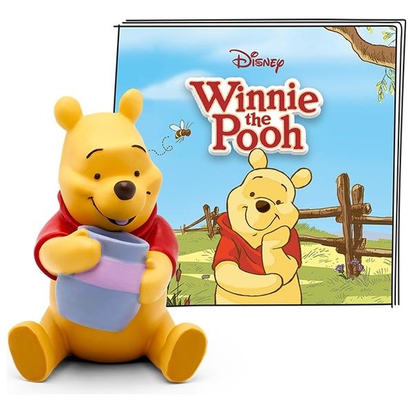 Yellow Winnie The Pooh with red tshirt Sitting with a blue pot in front of packaging.