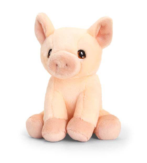 Cuddly pink sitting piglet toy.