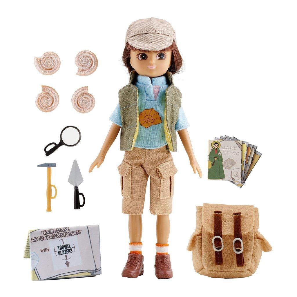 Lottie Fossil Hunter doll with ammonites, back pack, trowel, tools and information about archaeologists.
