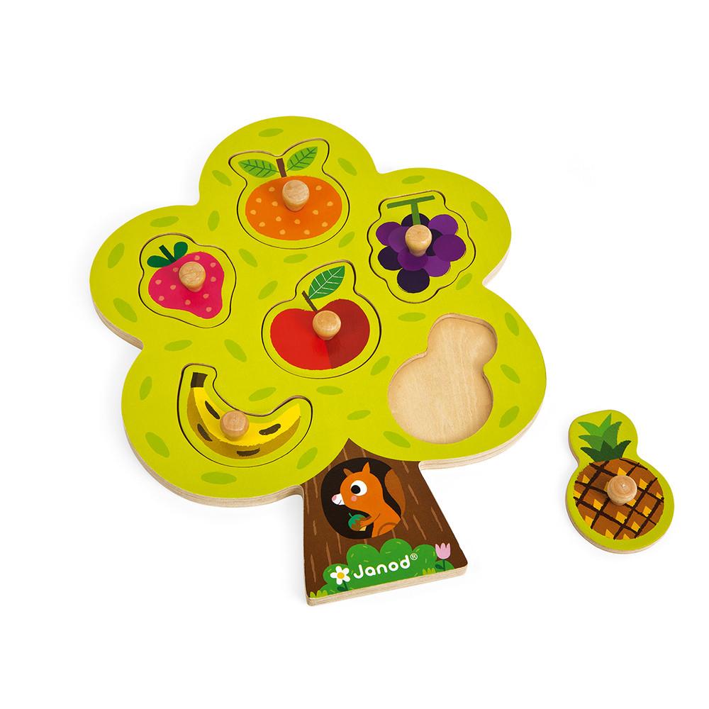 Wooden tree-shaped puzzle with wooden piece to the side.