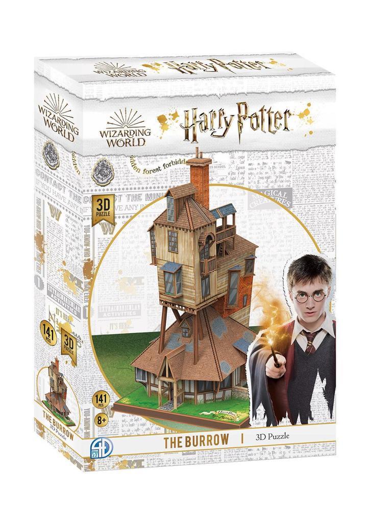 Box containing 3D puzzle of The Burrow building from Harry Potter.