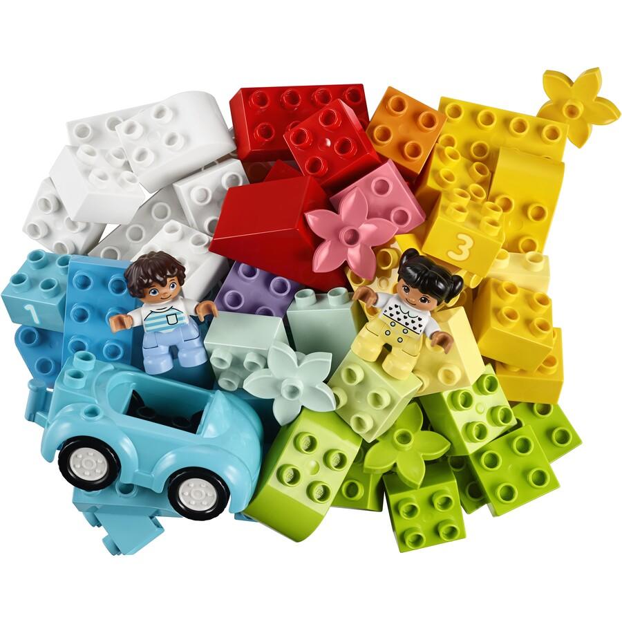 Bundle of Lego Duplo pieces grouped by colour.