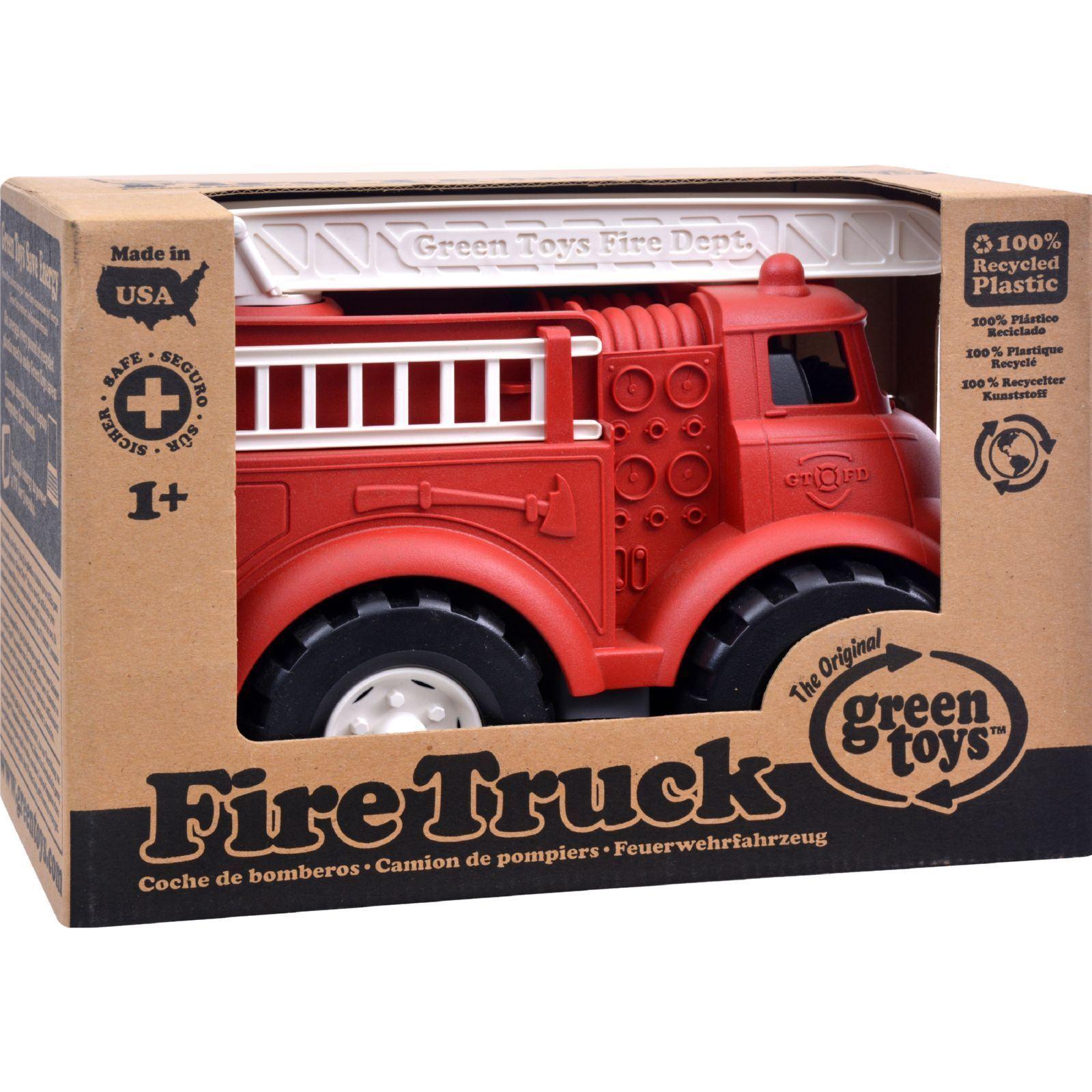 Red fire engine in manufacturer's packaging.
