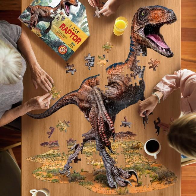 Image taken from above showing people working on the large raptor jigsaw puzzle.
