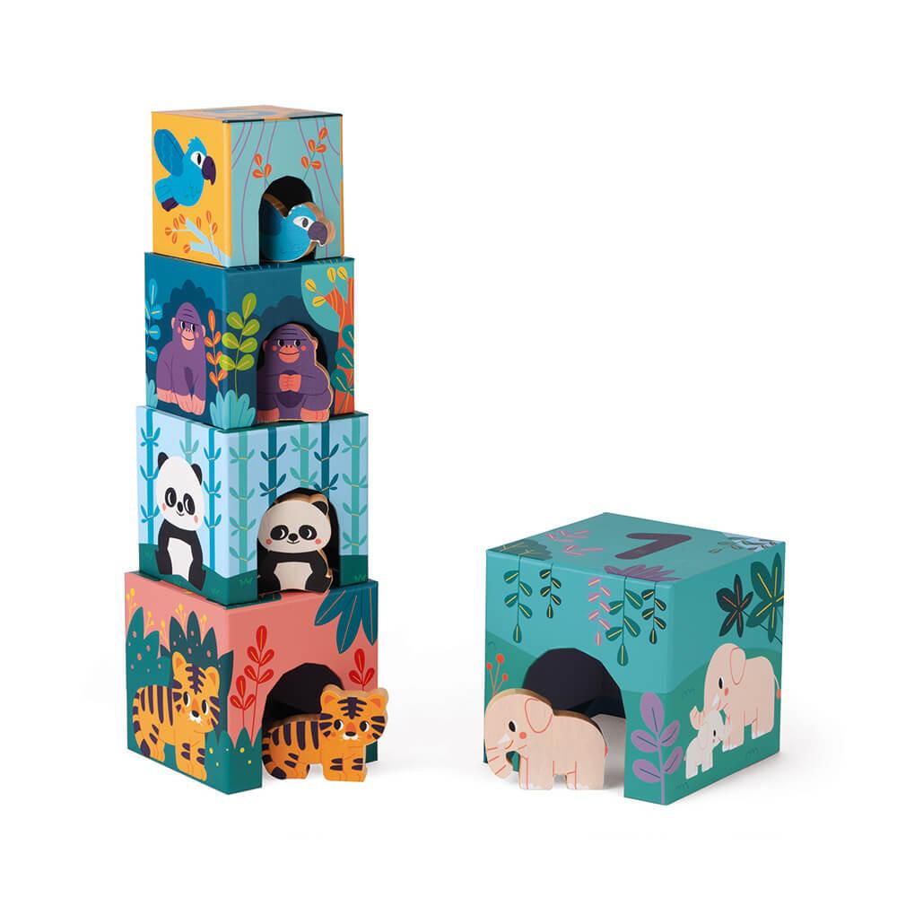 Colourful cardboard cubes stacked up with wooden animal figures peeking out.