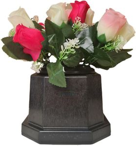 grave pot with pink artificial flowers