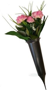 grave spike with pink artificial flowers