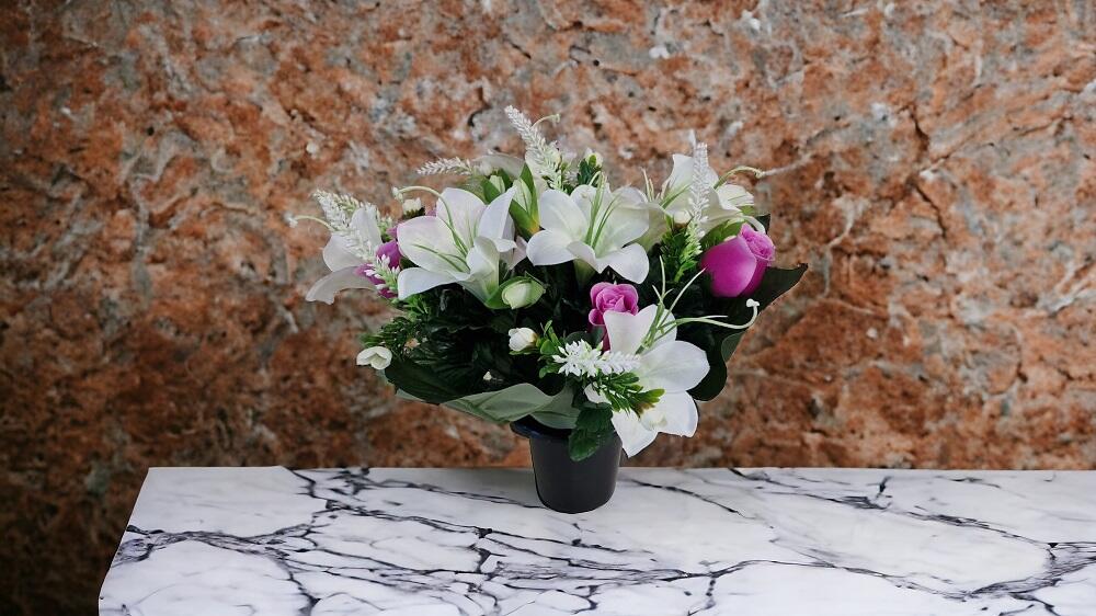 grave flower vase pot with lily flowers
