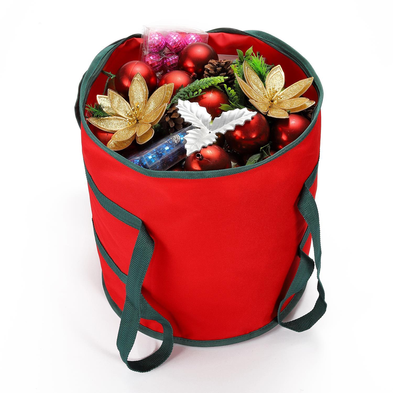 Made from PVC-coated 600D waterproof, tear-resistant red oxford fabric, this bag features green trim carry handles and a