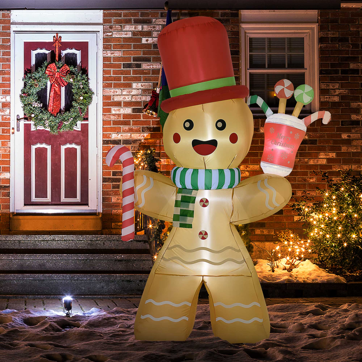 Lifestyle photo featuring 7.5FT Christmas Inflatables Gingerbread Man with Candy Cane LED Lights in everyday use.