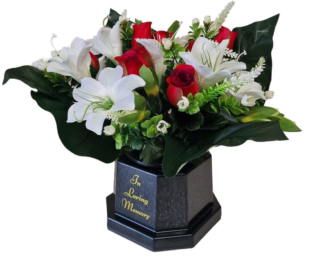lily and roses in a grave pot vase