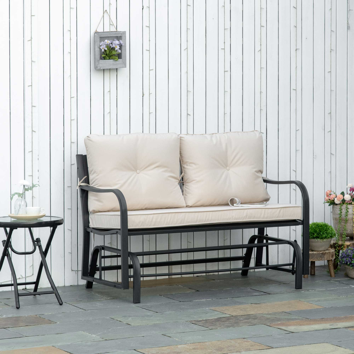 2-person rocking chair with armrest & weather resistant cushions, khaki used in home or garden settings