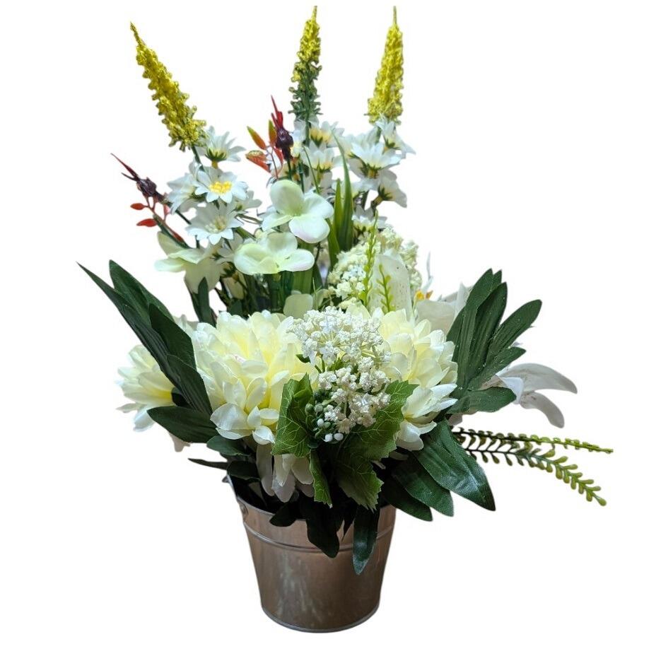 This large table centrepiece measure 35cm height, filled with large chrysanthemum, lily and foliage