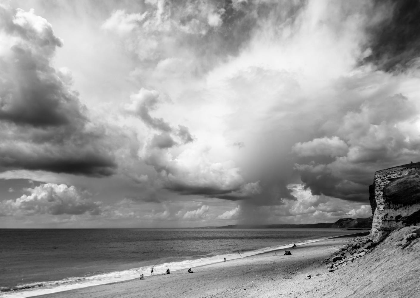 An image called Cloudburst from the Dorset Coast, a black and white coastal classic