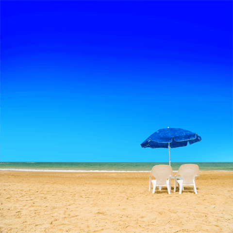 beach chairs and a parasol