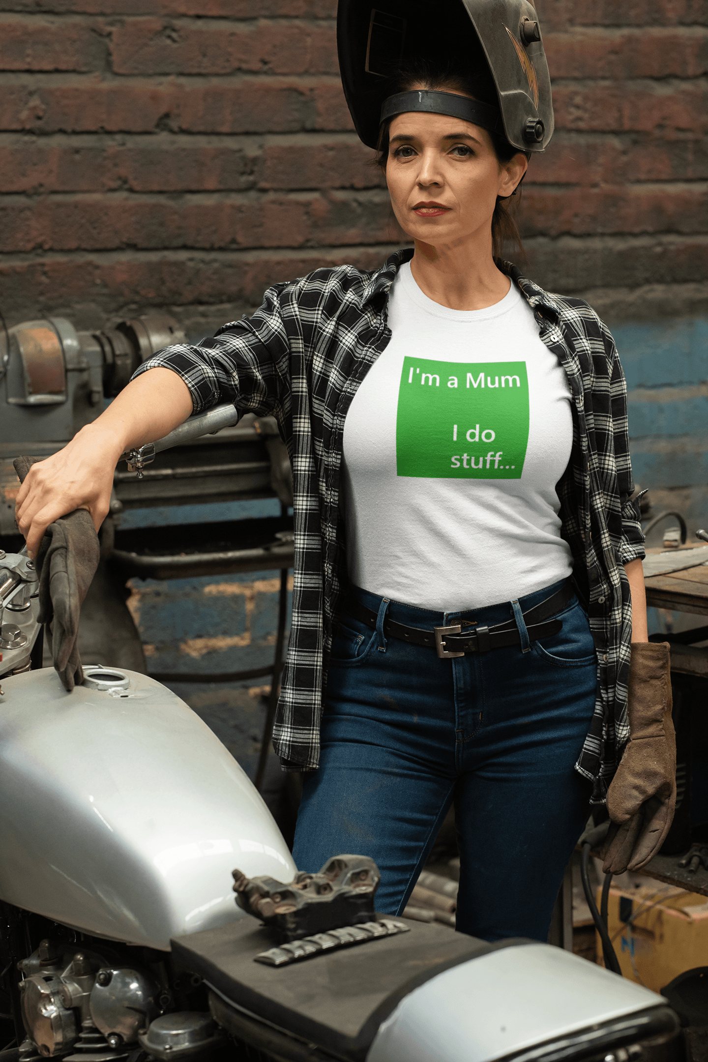 woman mechanic wearing a slogan t-shirt