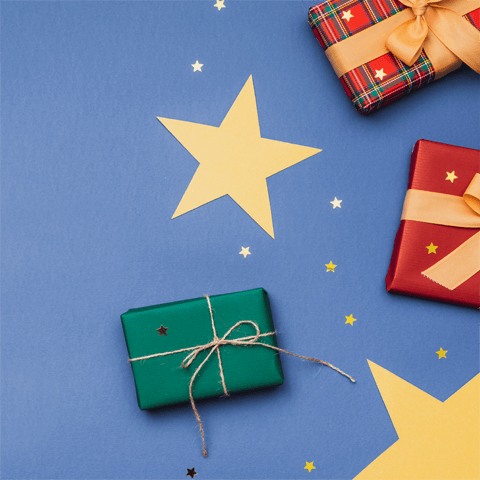 christmas presents and stars on a blue background
