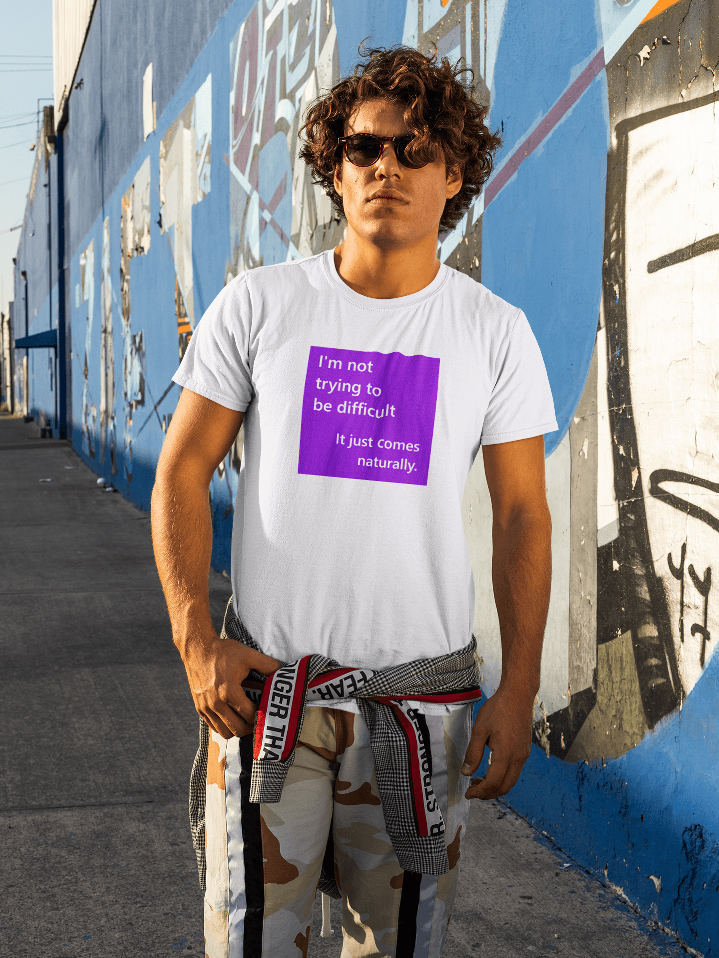 young man wearing a slogan t-shirt