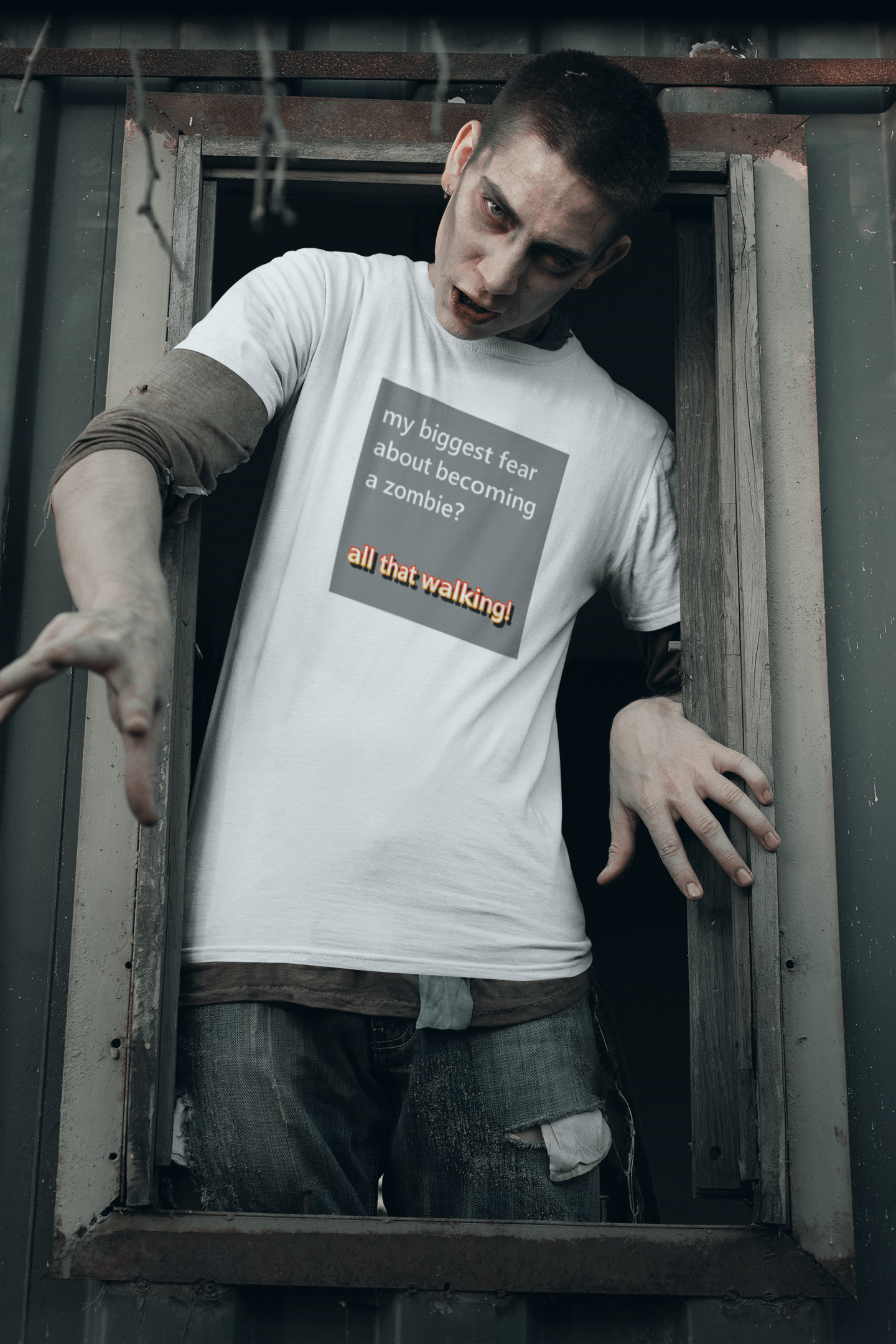 male zombie climbing through a window wearing a slogan t-shirt