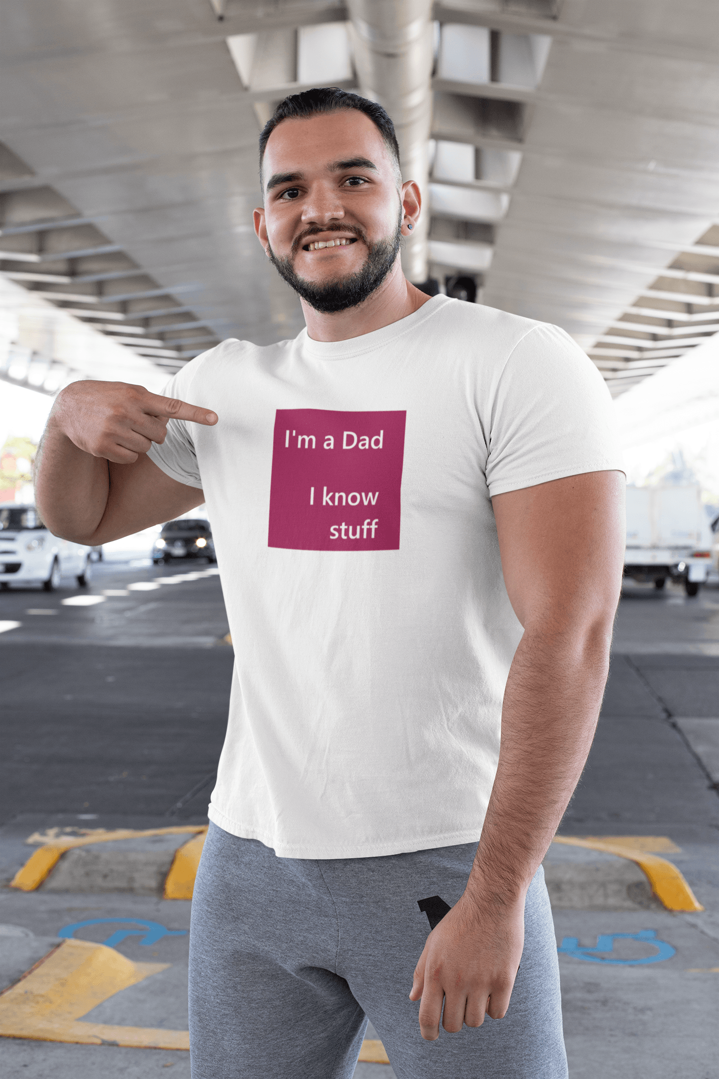 bearded man wearing a slogan t-shirt