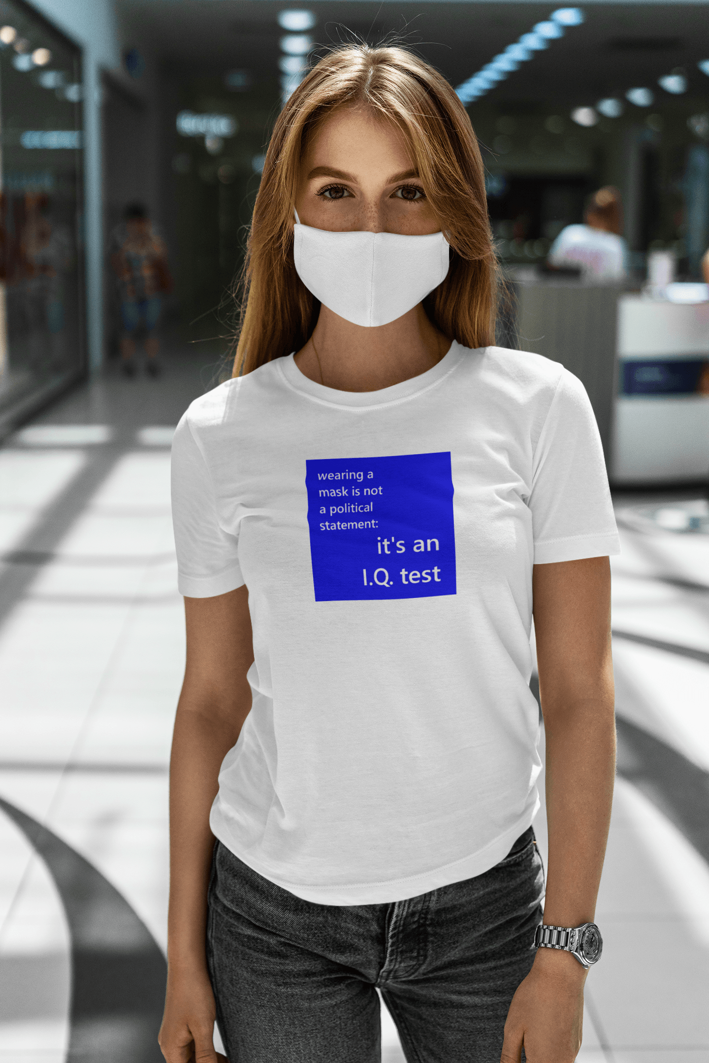 woman wearing a face mask and a slogan t-shirt