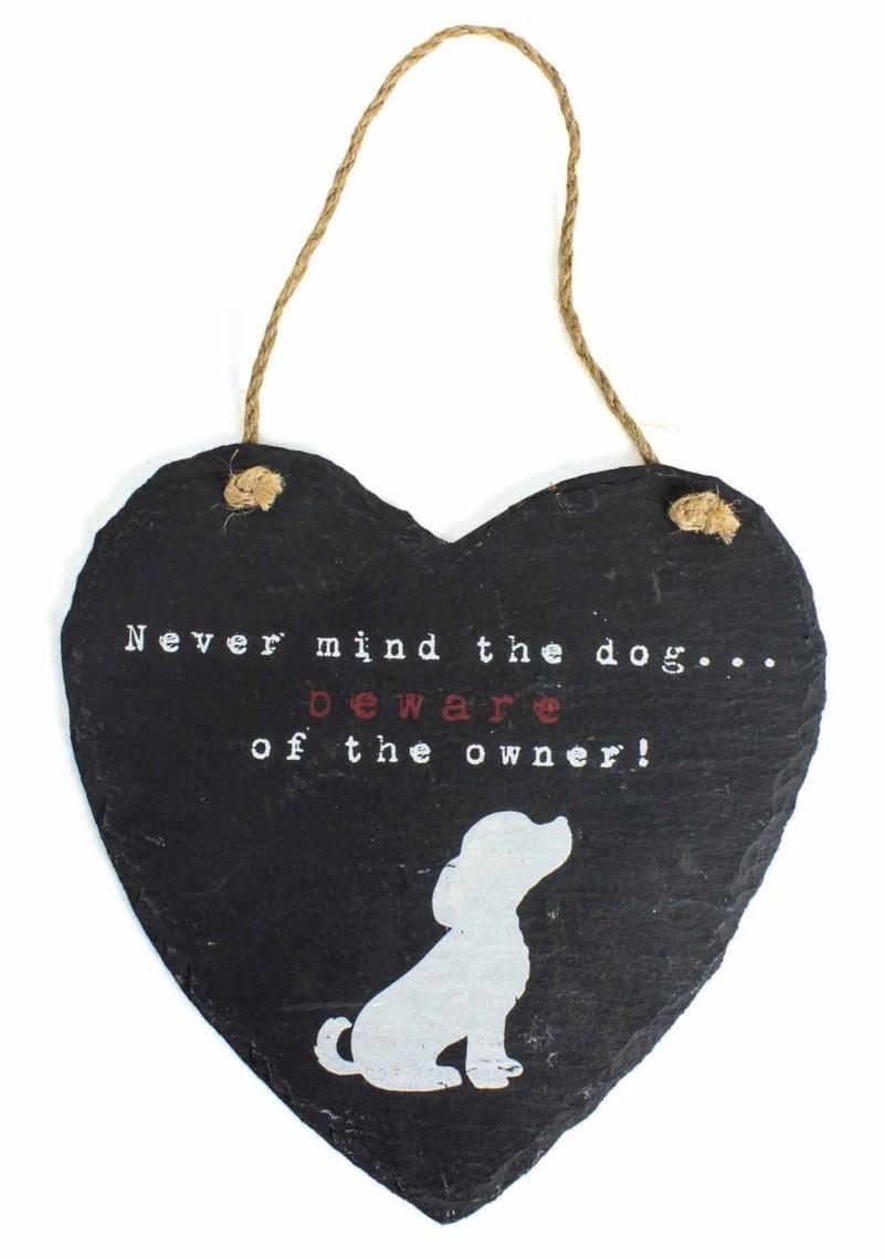 Heart shaped slate sign bearing the words 'Never mind the dog - Beware of the Owner'
