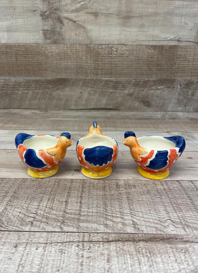 SET OF THREE BLUE RED AND ORANGE CHICKEN EGG CUPS07-03-2021 at 11.39.26 2.JPG
