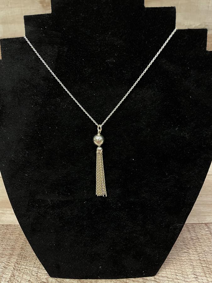 SILVER COLOURED BALL AND TASSEL PENDENT ON SILVER COLOURED CHAIN02-03-2021 at 09.47.07 2.JPG