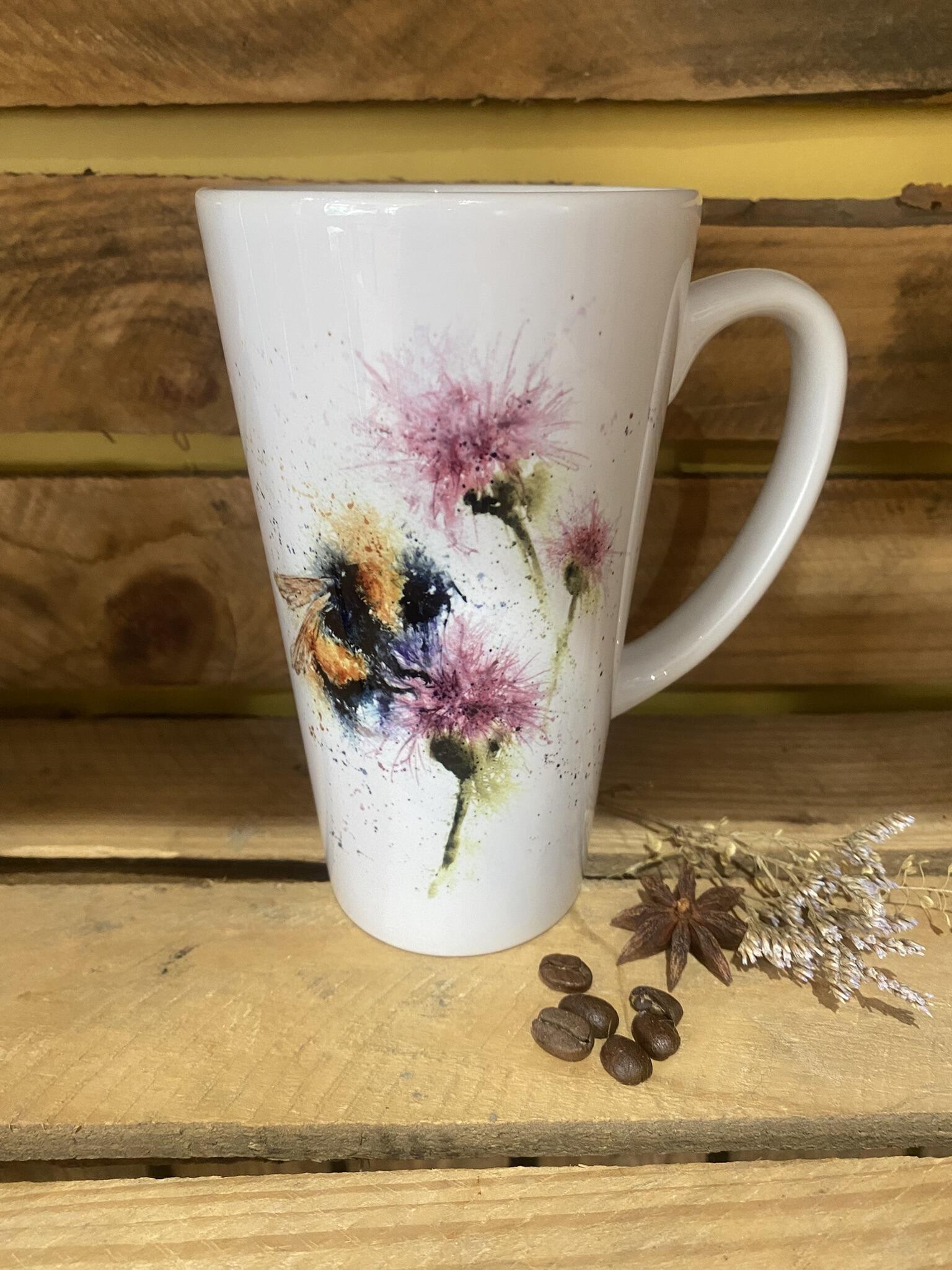 bees and thistles watercolour painting on a latte mug