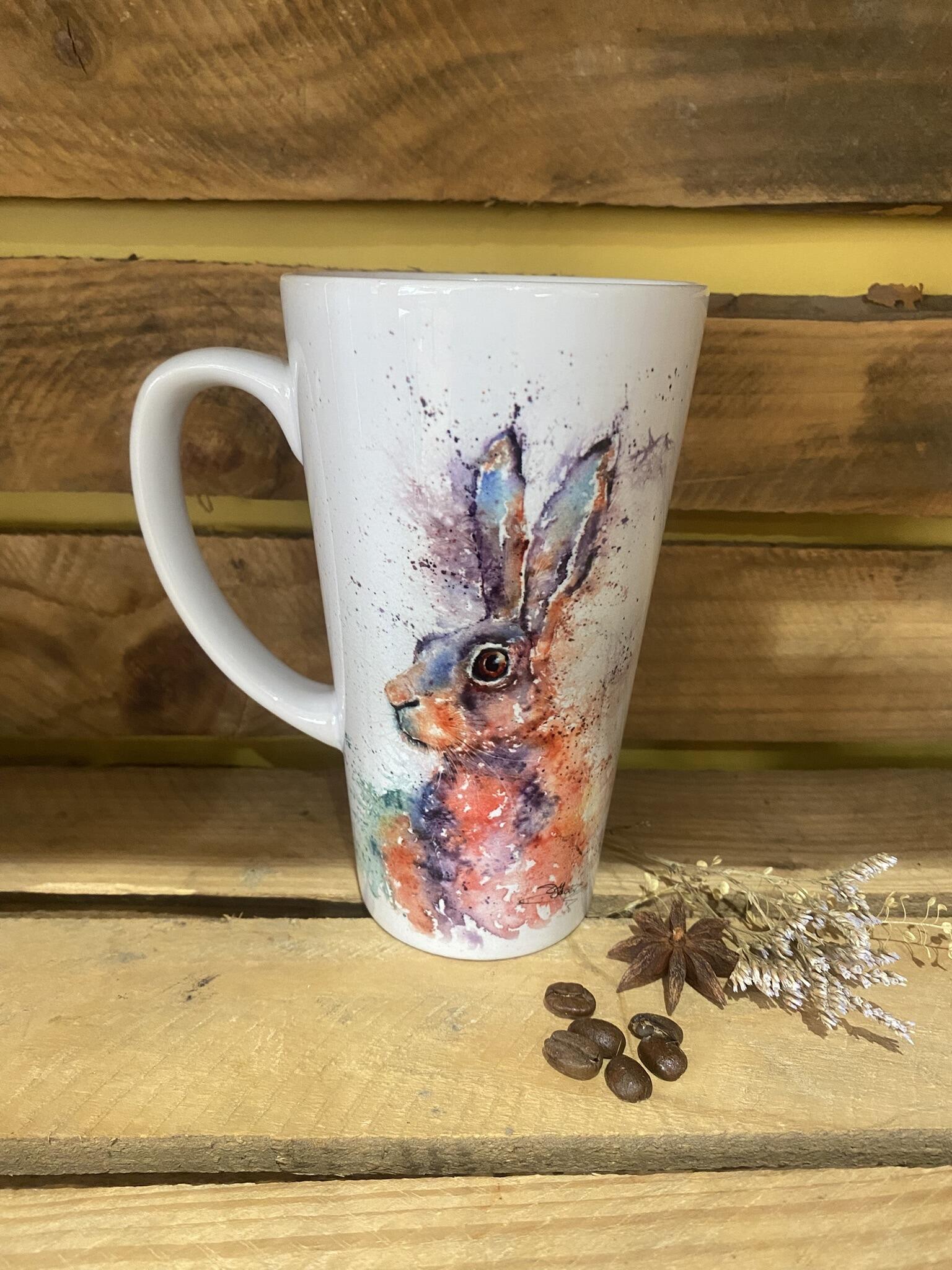 hare art on a large latte cup
