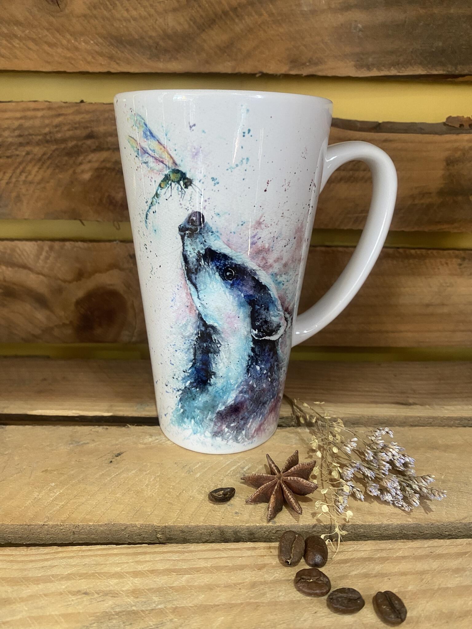 badger and dragonfly watercolour on a latte coffee mug