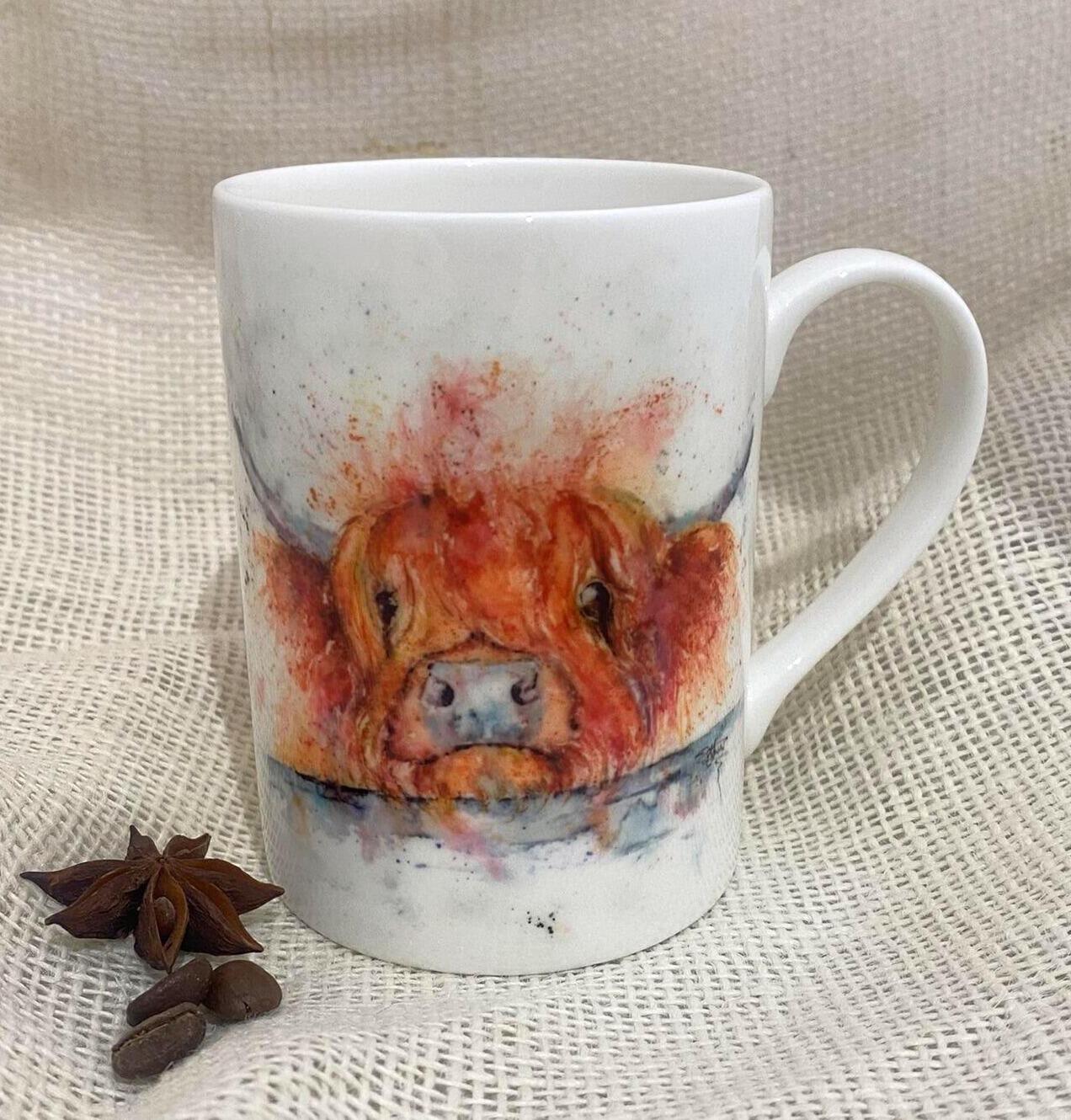 scottish cow on a mug