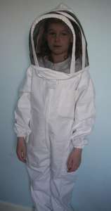 Child in White Fencing Beekeeping Suit