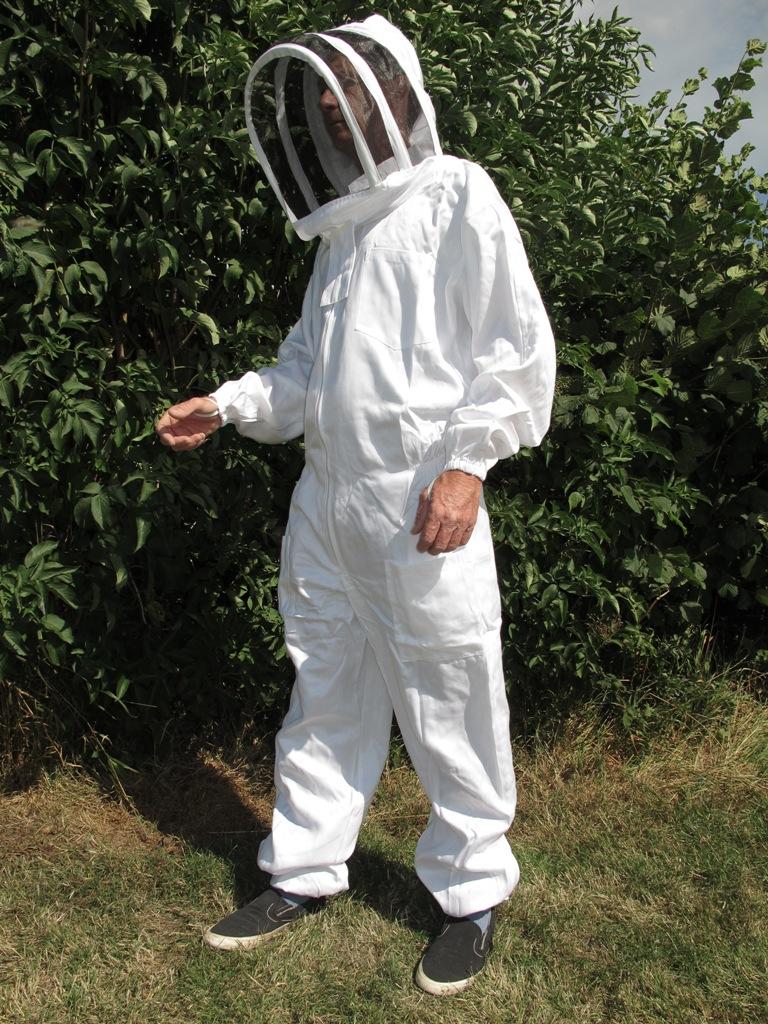 Man in White Fencing Veil Beekeeping Suit