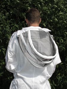 Back of man in White Fencing Veil Beekeeping Suit