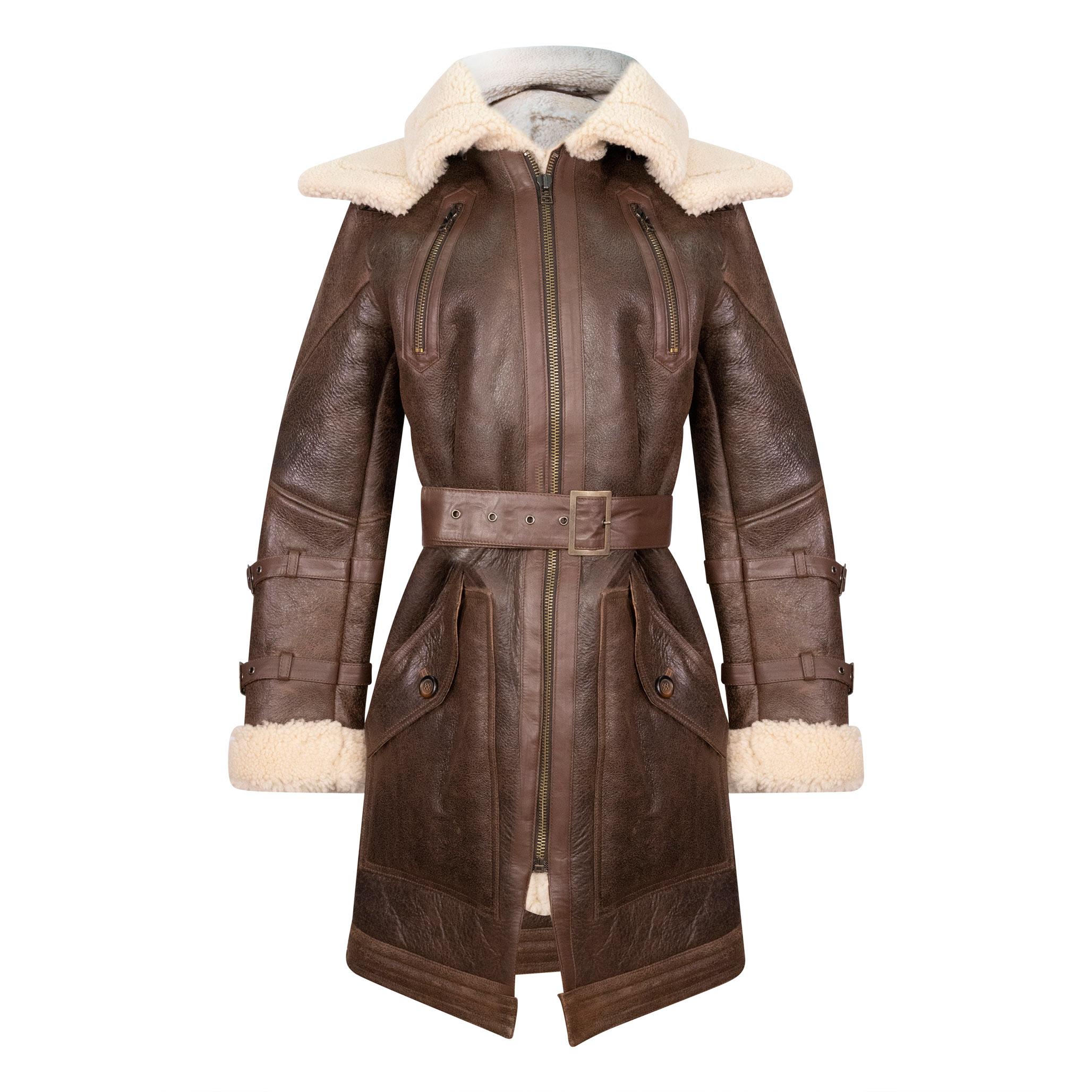 An striking long brown sheepskin trench coat with a cream fur interior