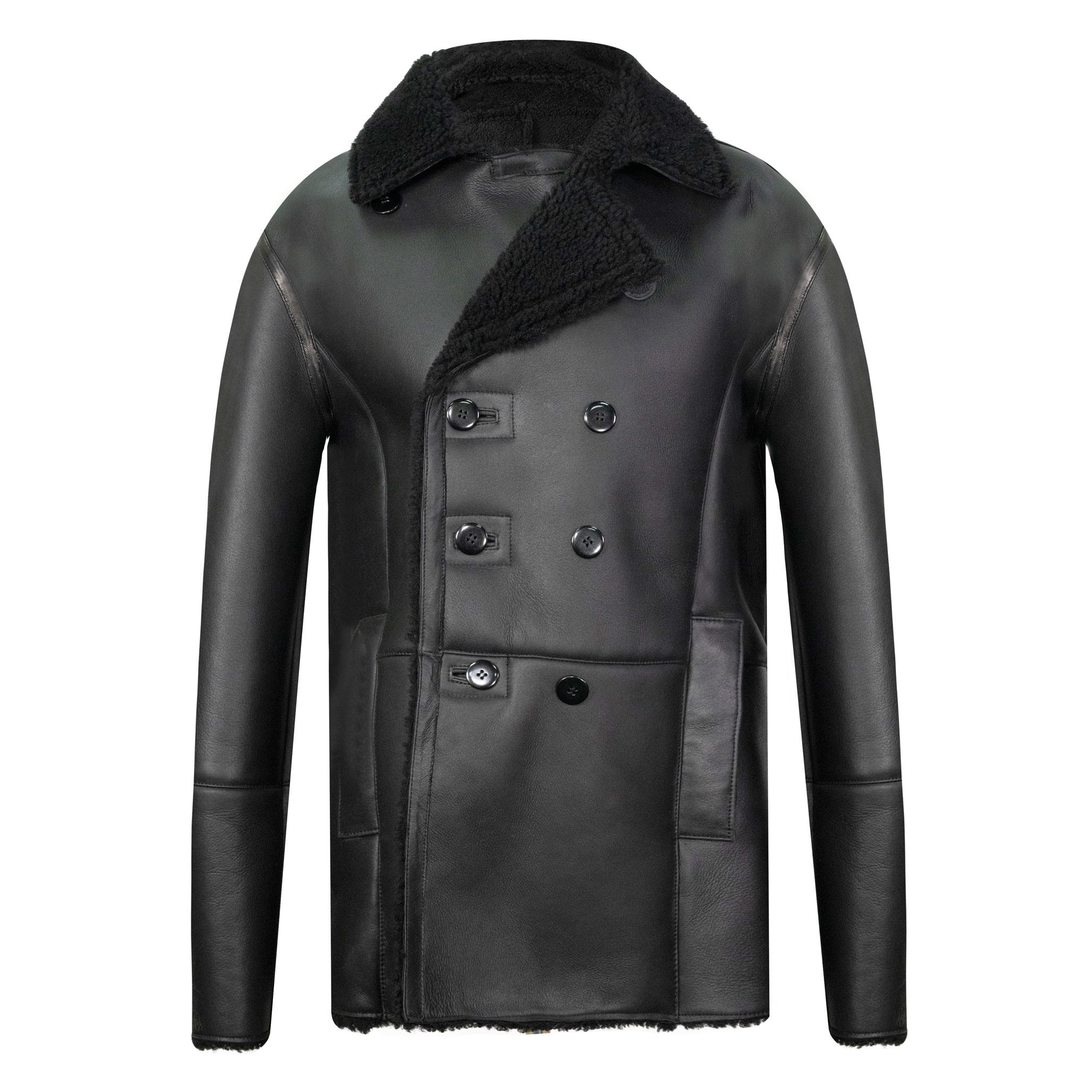 A luxurious sheepskin coat in black. Buttoned double breasted fastening. Black inner fur. 3/4 length.