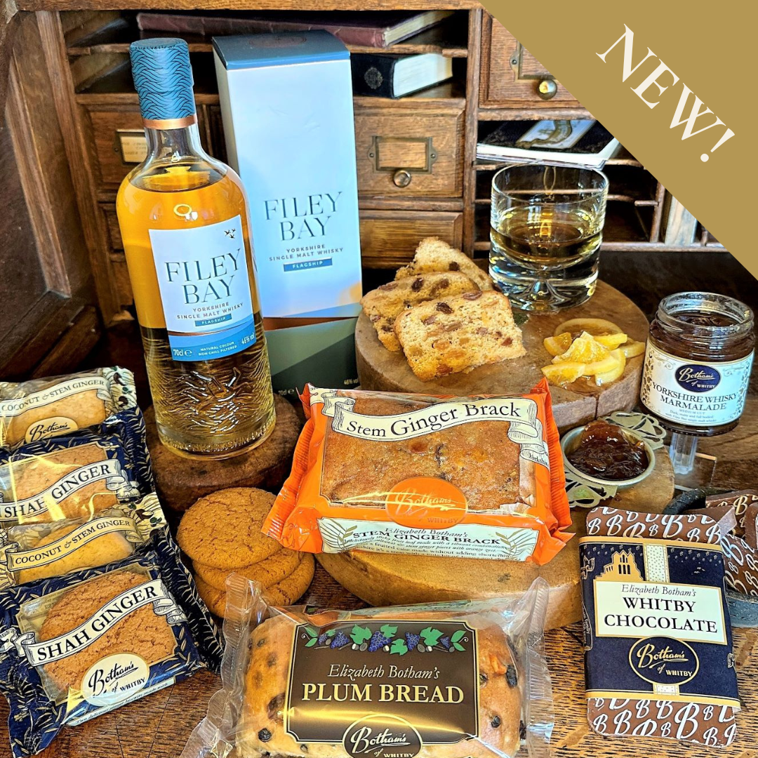 Image displays content of The Old Fashioned, Filey Bay Whisky hamper, including: Filey Bay Yorkshire Single Malt Whisky (flagship), Yorkshire Whisky Marmalade, Stem Ginger Brack, Botham's Chocolate Bar, Plum Bread and four packets of 2-Pack Biscuits.