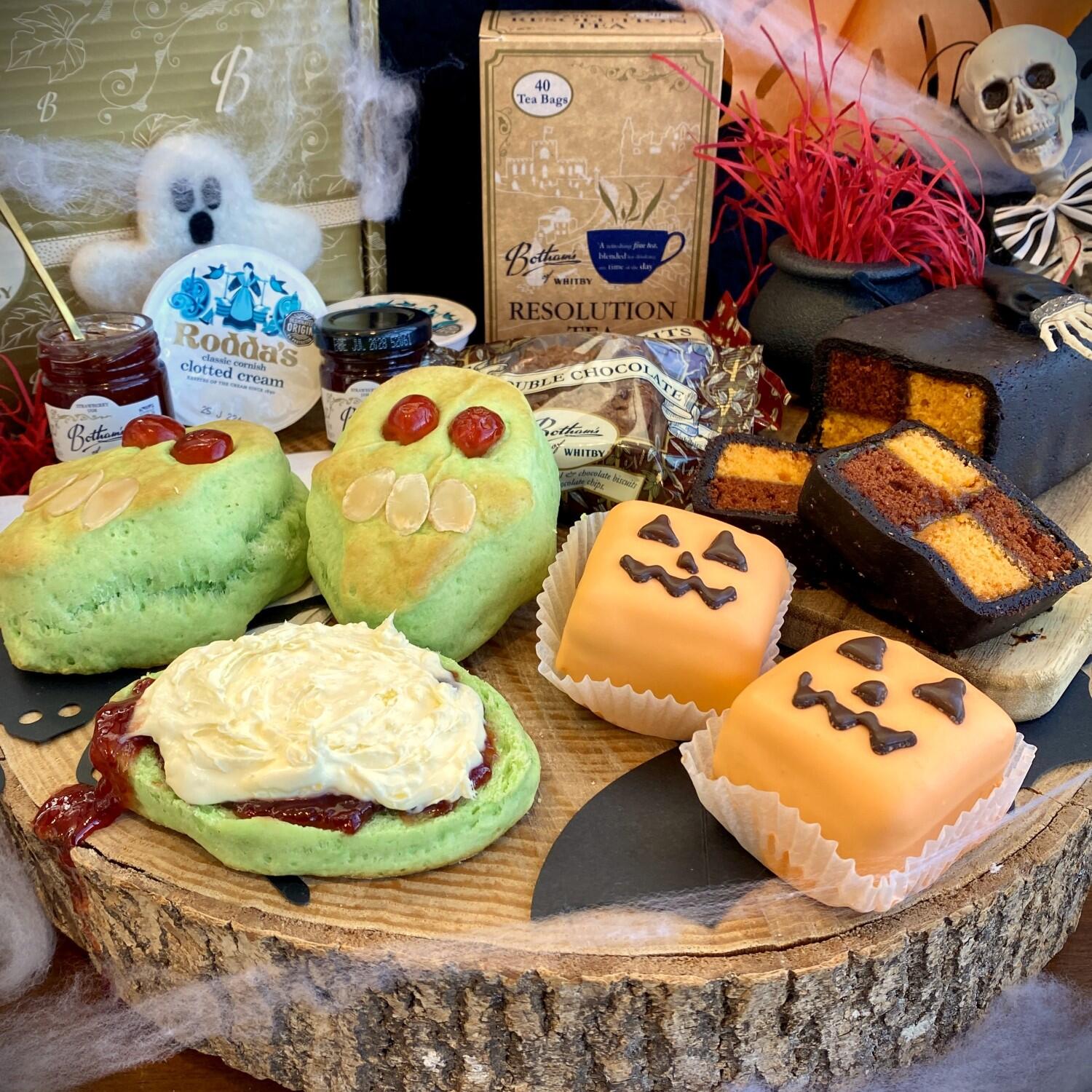 Botham's of Whitby 1865 Halloween Afternoon Tea Gift Box...Muhaha! featuring Green Skull Scones, Jack-O'-Lantern Almond Fancies, Chocolate Orange Battenburg and Resolution Tea. An alternative and horrifyingly delicious Afternoon Tea from Botham's iconic Whitby bakery.