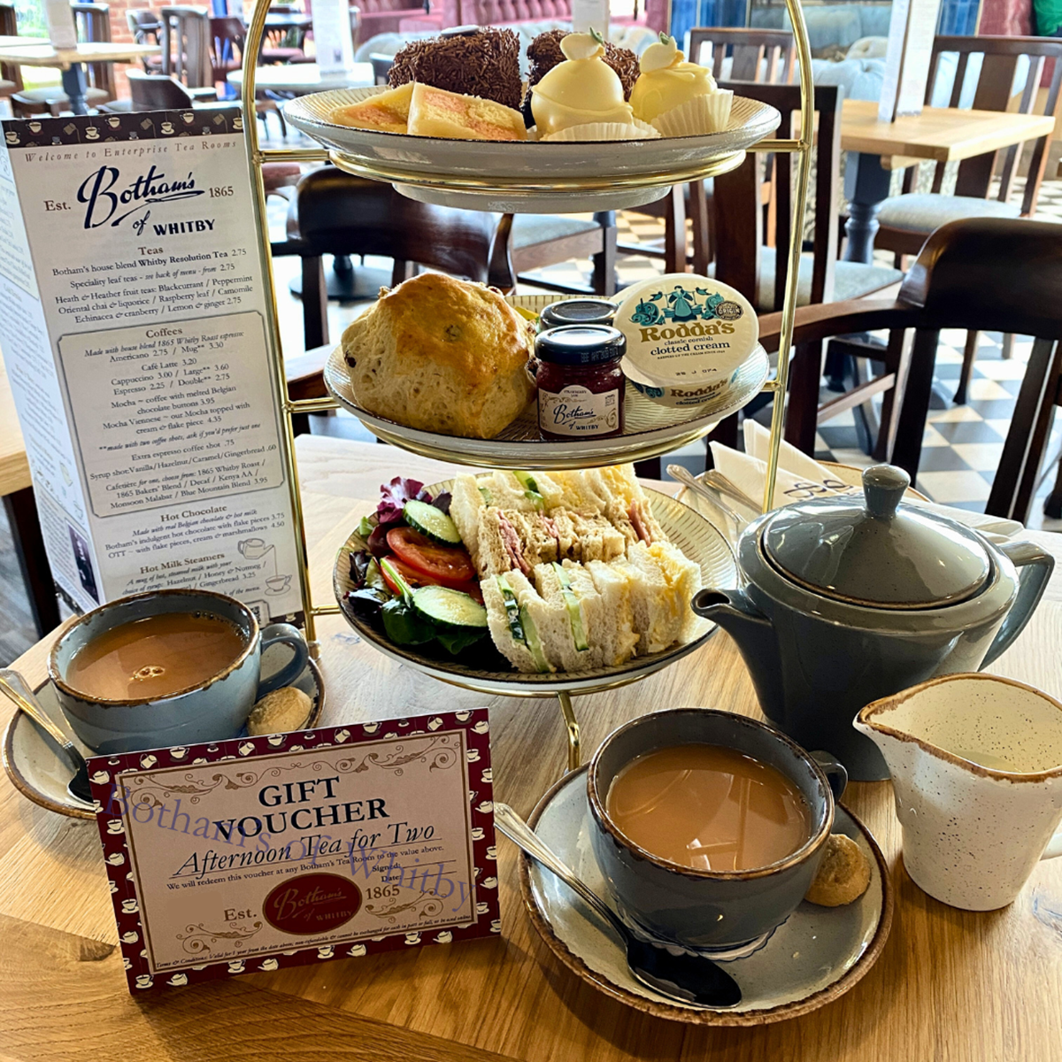 Botham's of Whitby Ghastly Ghouls Cake Club which is a letterbox sized hamper containing seven spooky small cakes from Botham's iconic Whitby bakery, including Witches' Fingers, Jack-O-Lantern Button Moon, Fang Caramel Apollo, Novelty Ghost Biscuit and Goblin's Peppermint Brownie.