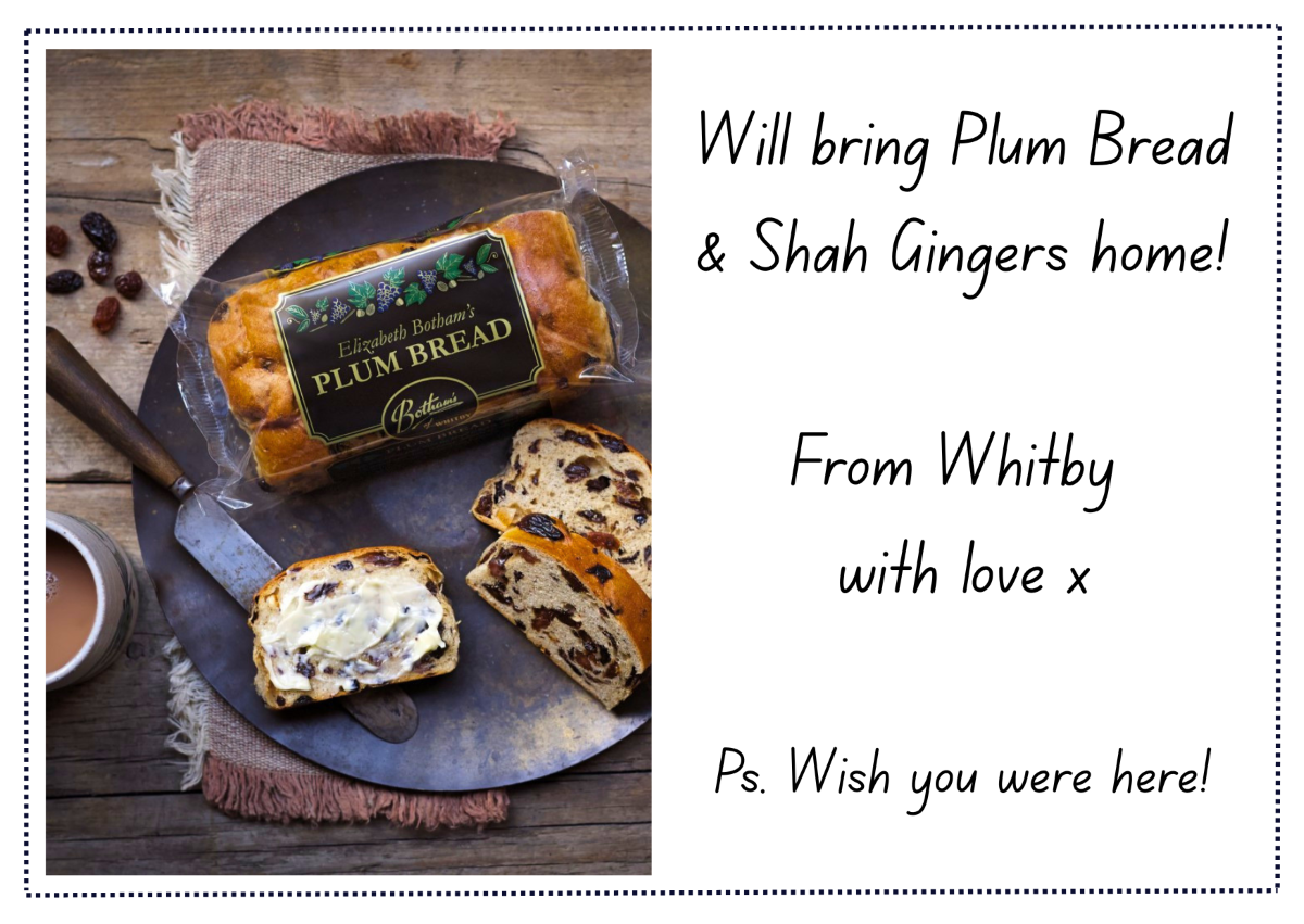Postcard from Whitby with the text: 'Will bring Plum Bread and Shah Gingers home! From Whitby with love x Ps. Wish you were here!' with a left-aligned image of a lifestyle set-up for Plum Bread.