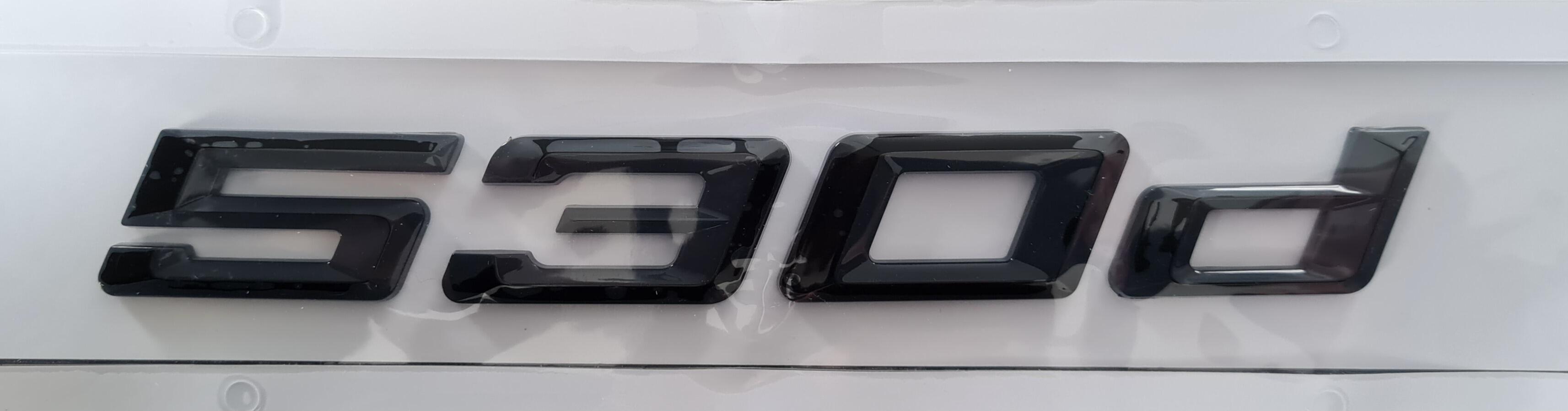 BMW 530D Gloss Black badge.