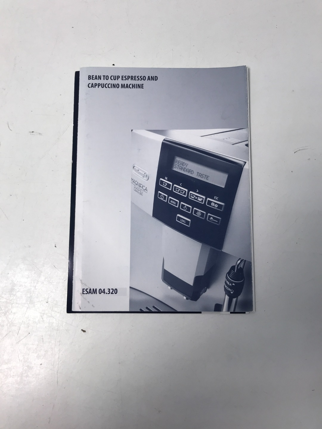 après le changement de la carte mère, la delonghi magnifica bloqué position haute, - Cafetière