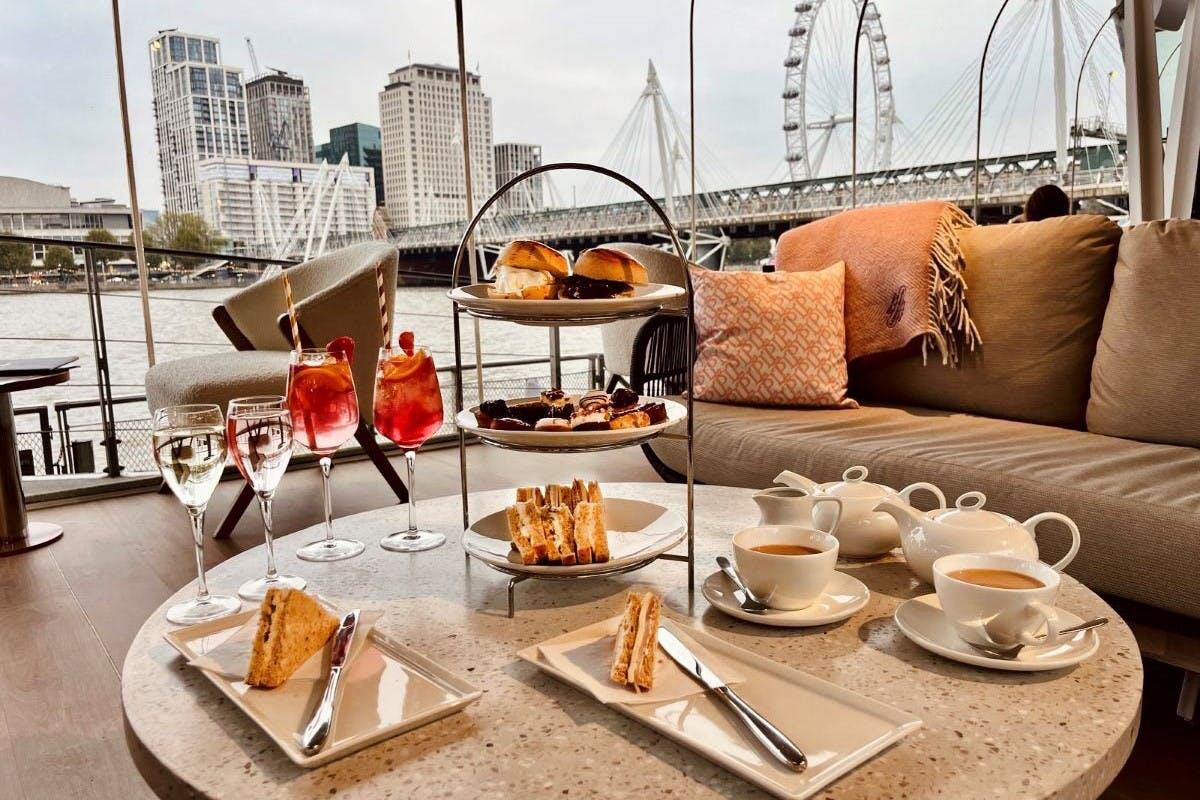 Afternoon Tea with Champagne, Cocktail or Soft Drinks for Two Adults and Two Children at Clipper Lounge EMB