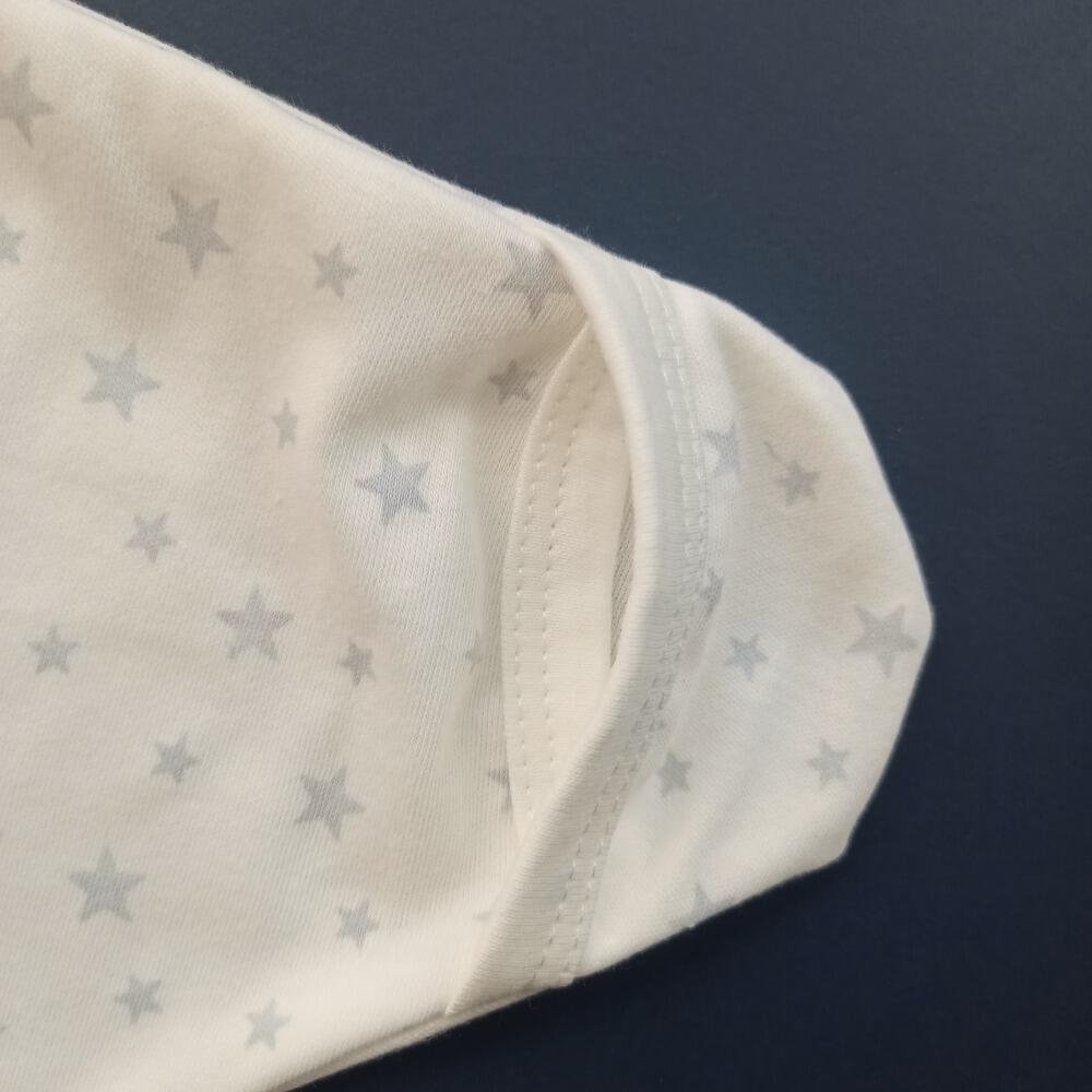 Hand opening detail on Cotton Starsnug Star Baby Wrap