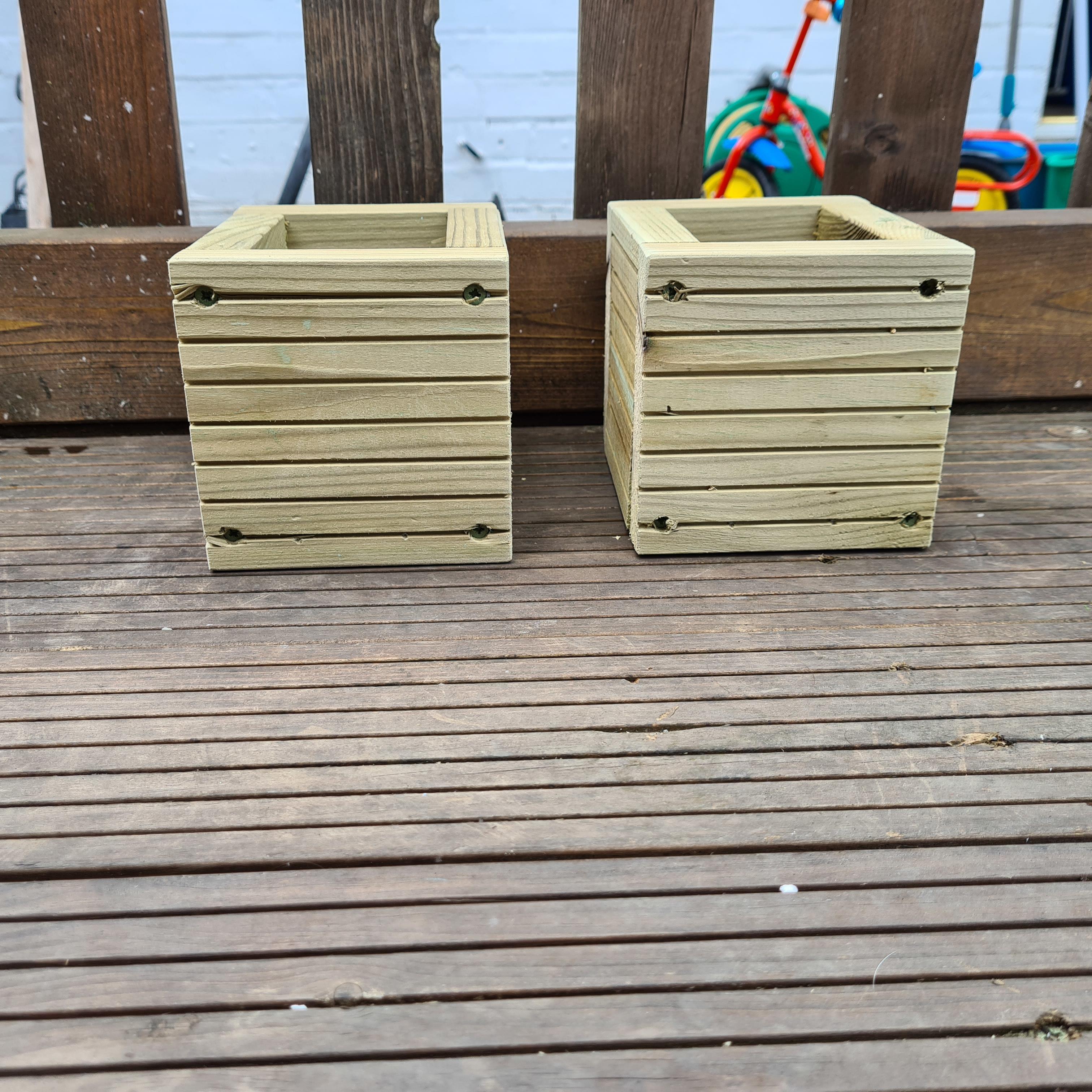 2 herb boxes on a deck area