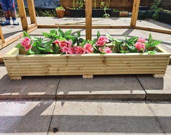 decking planter with fake flower display