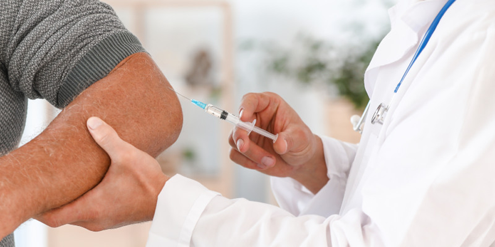 BPC-157 being injected into man's arm