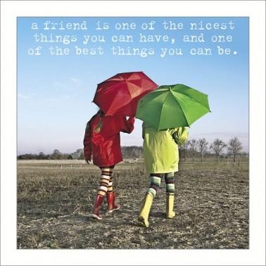 Two children holding umbrella's, wearing welly boots on muddy field, blue sky with text ' a friend is one of the nicest things you can have, and one of the best things you can be.