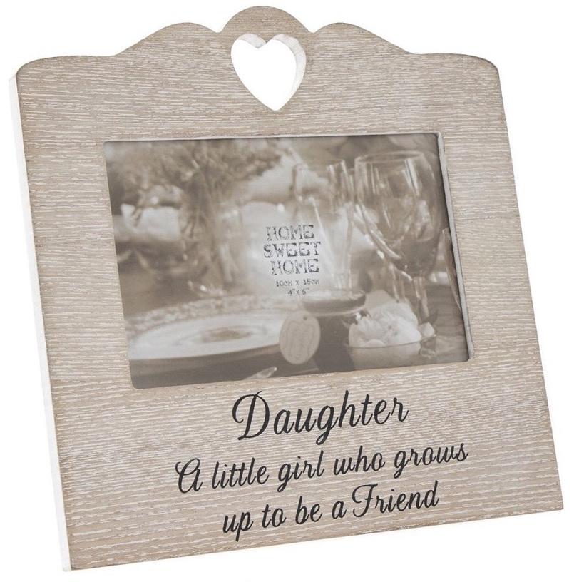 Distressed wood look photo frame, cut out heart decoration and dark text ' Daughter a little girl who grows up to be a friend'.